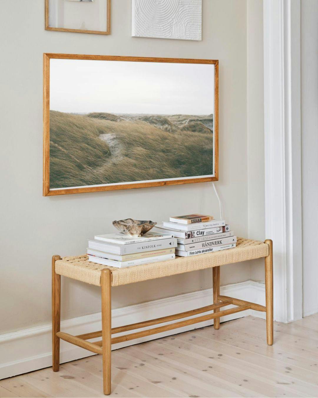 Lad fjernsynet blive en del af billedvæggen