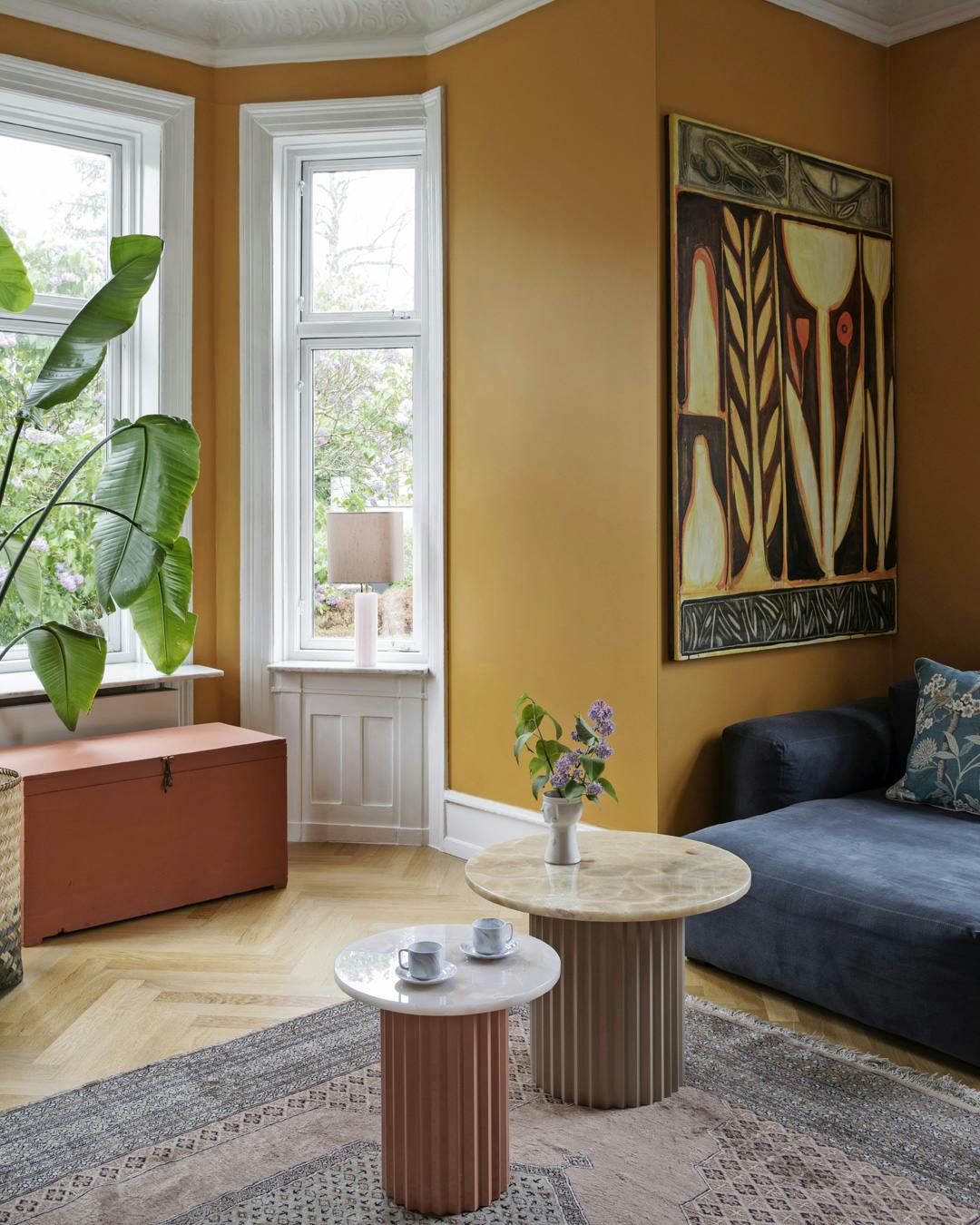 heim_boutique_stue_kunst_orange-vaegge.