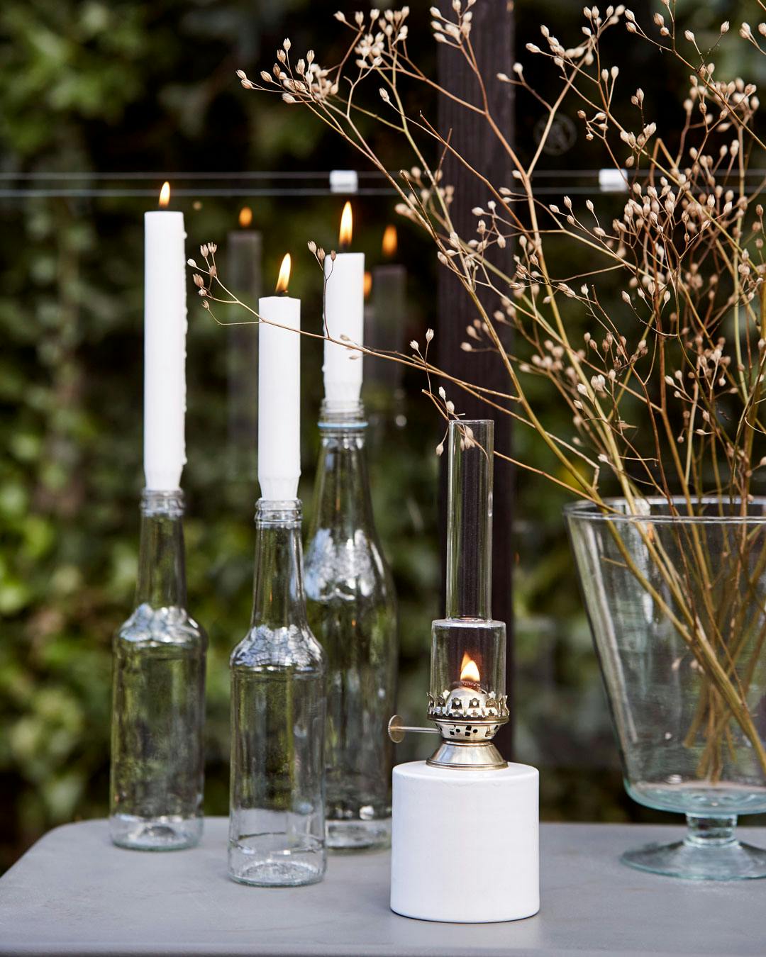 Indretning af orangeri og drivhus - lysestager af flasker